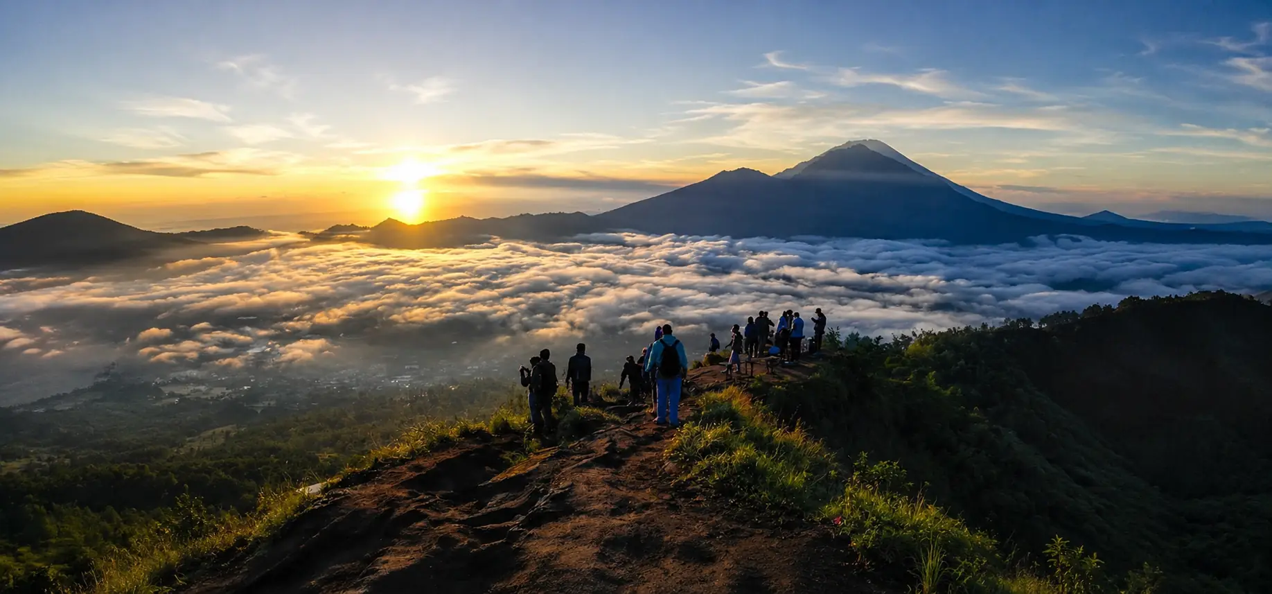 Mount Batur sunrise trekking trail and volcanic scenery in Bali at dawn
